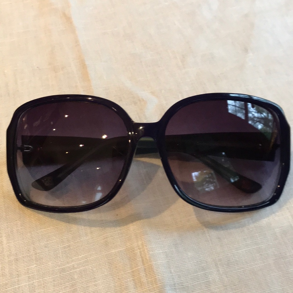 BCBG MaxAzria blue and green sunglasses.